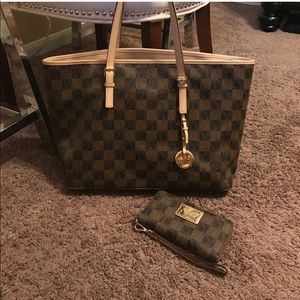 Michael Kors tote and matching wallet.